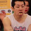Watch Kobayashi Jam Soaking Wet Hot Dogs Down His Throat In Slow Motion